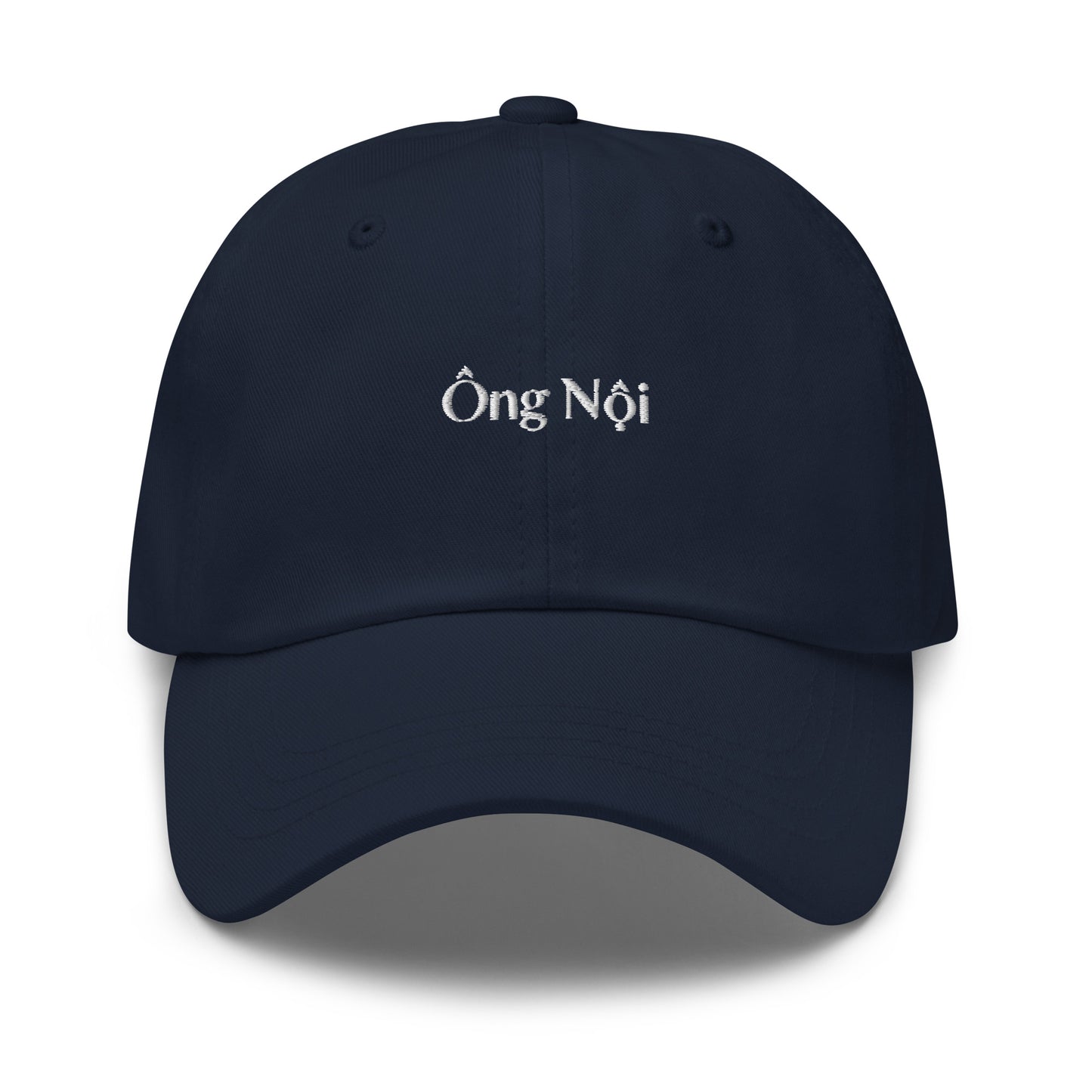 Navy blue dad hat with words Ong Noi in white stitching in the middle of the front of the hat. Front View