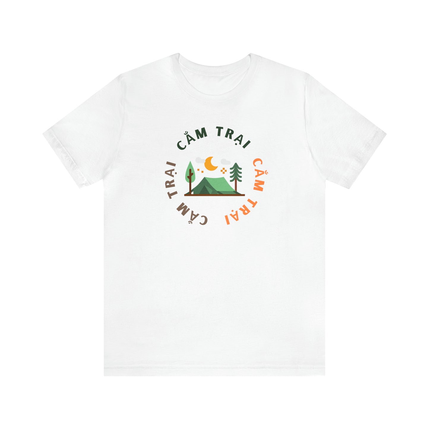 White t-shirt with a campsite design. Around the campsite are the words Cam Trai written 3 times in green, orange, and brown.