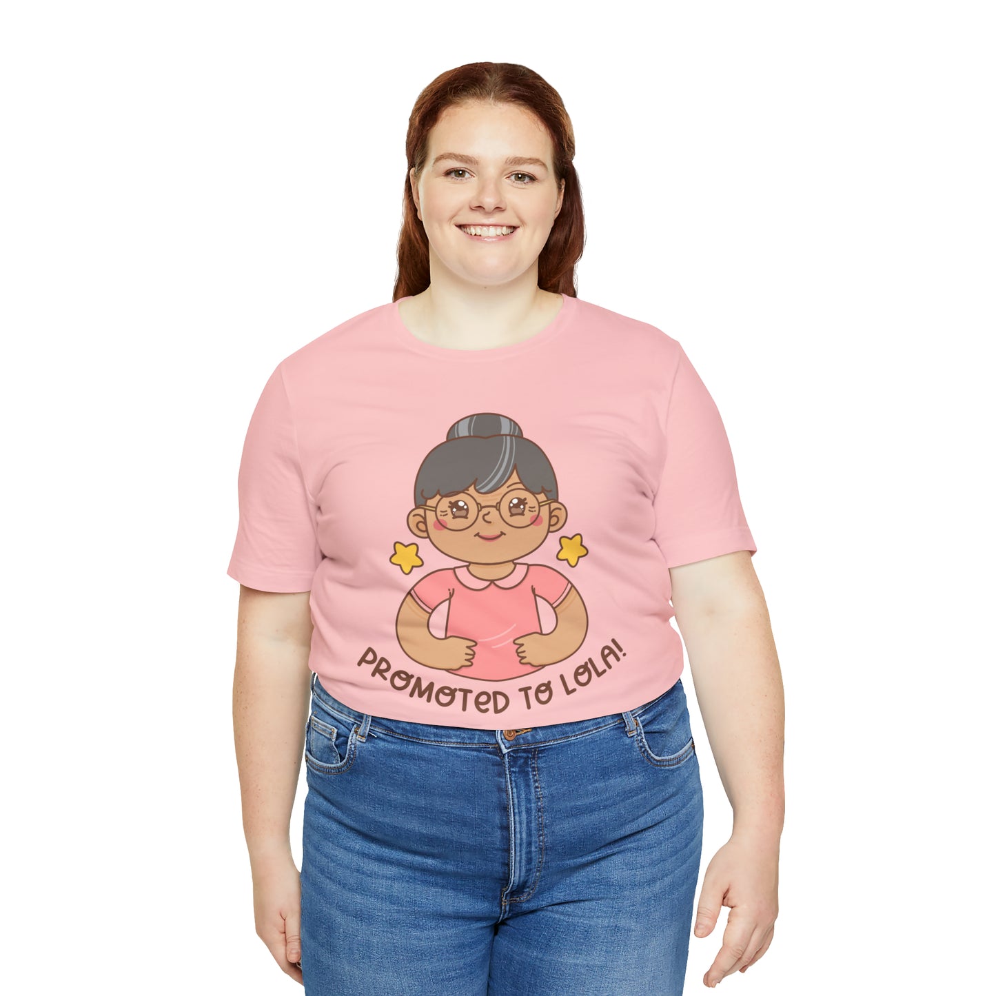 Pink t-shirt with kawaii grandmother wearing glasses and her hair in a bun with the words Promoted to Lola! under the picture.