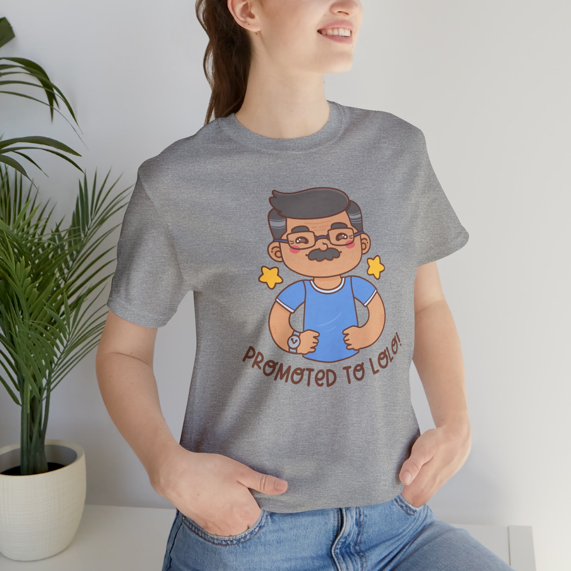 Gray t-shirt with kawaii grandfather-looking man wearing glasses and a blue shirt with the words Promoted to Lolo! under the picture.