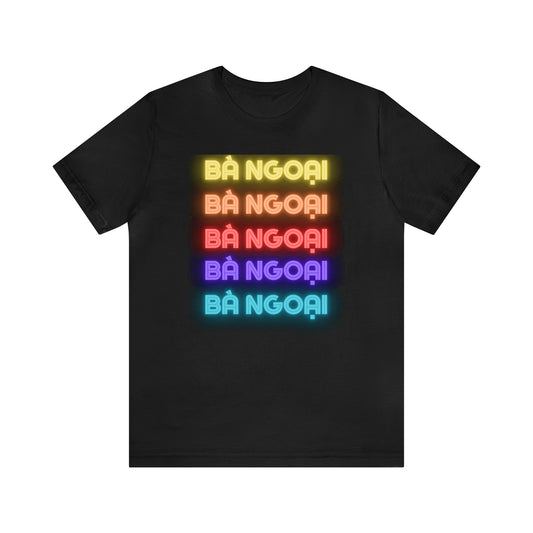 Five rows of the words Ba Ngoai with each row a different color of the rainbow. Black shirt. Front view.