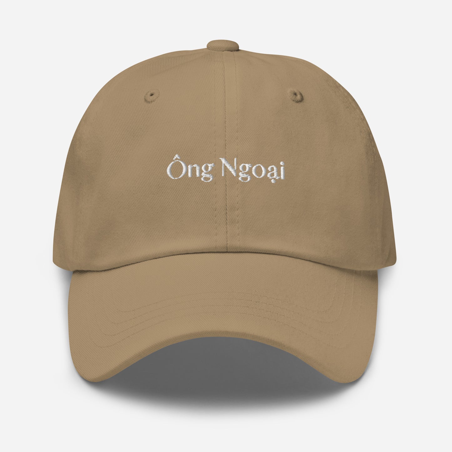 Khaki dad hat with words Ong Ngoai in white stitching in the middle of the front of the hat. Front View